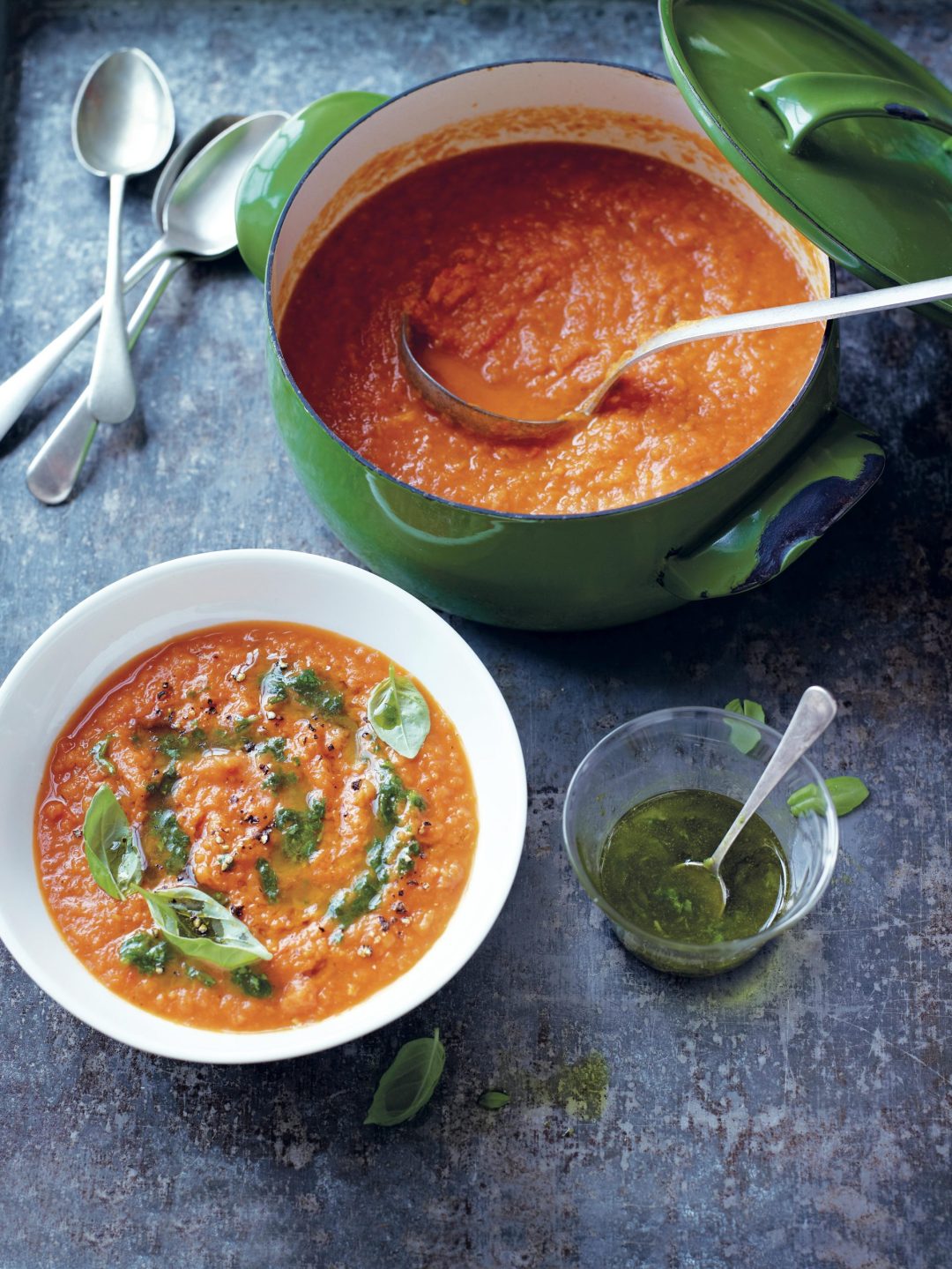 Tomato soup with fennel, garlic and basil drizzle