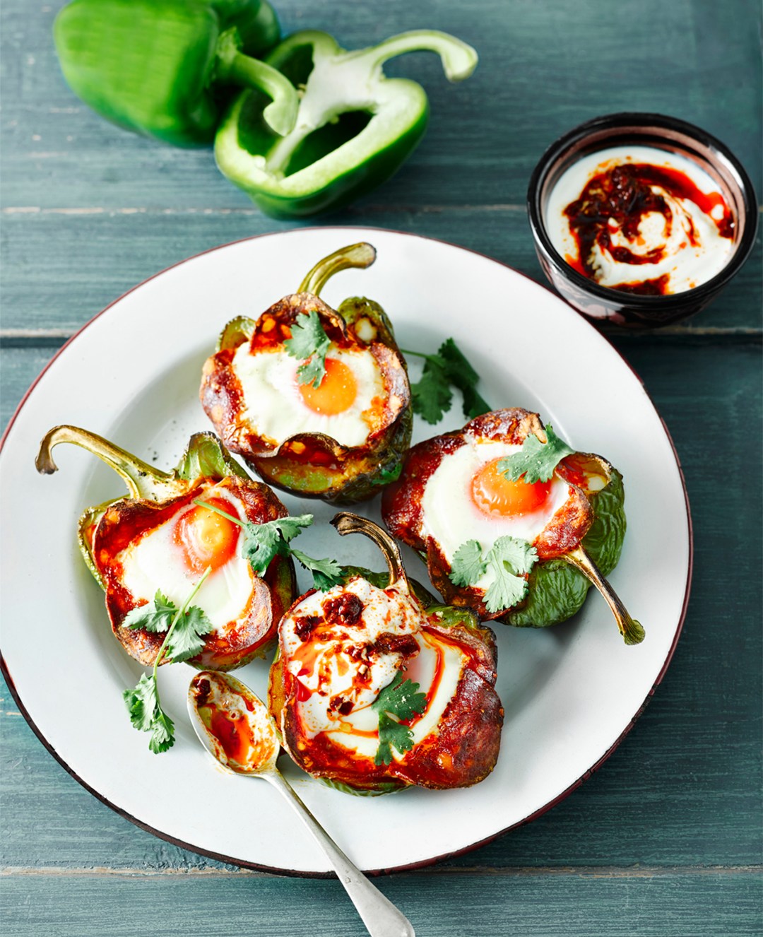 Roasted green pepper pot with baked eggs, chorizo and harissa yoghurt