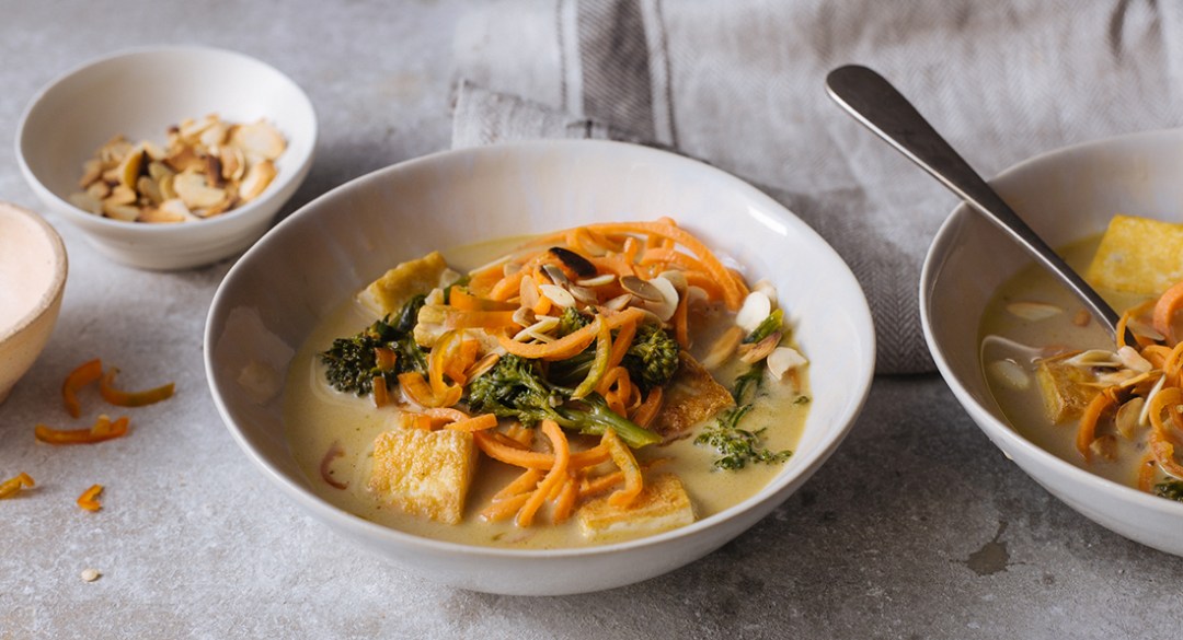 Malaysian tofu and carrot noodle laksa with flaked almonds